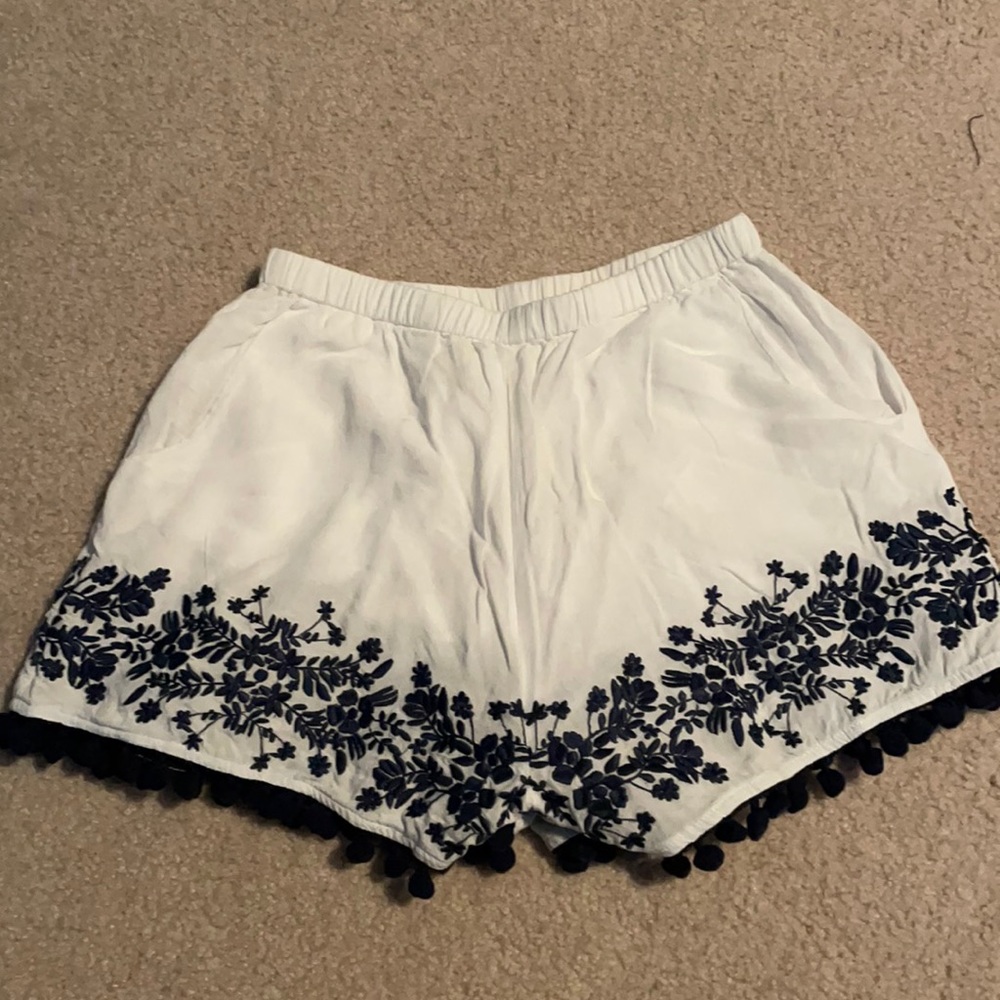 White shorts with blue detail